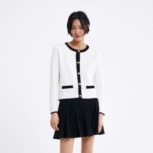 White Cardigan with Pearl Buttons and Black Trim